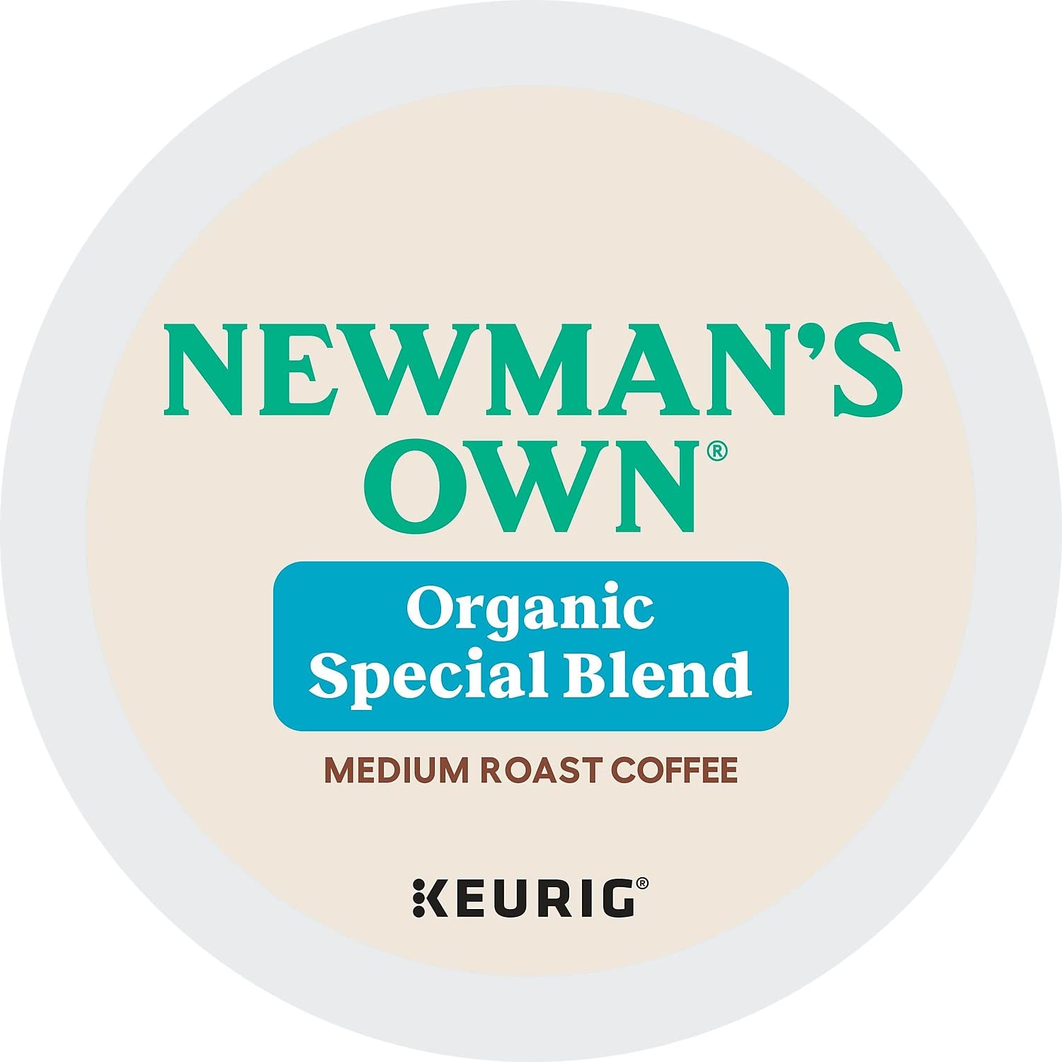 Newman's Own K-Cup next to a hand for scale showing compact, portable portion control