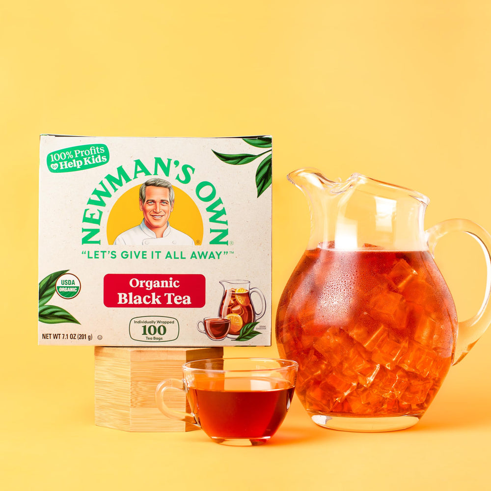 Newman's Own size comparison with 100 tea bags illustrating quantity and value