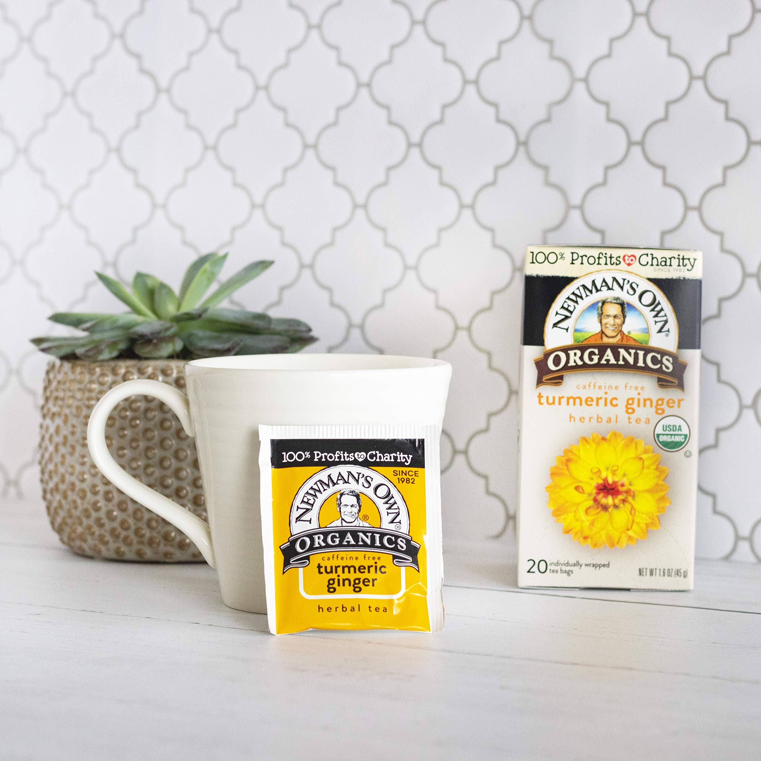 Newman's Own tea box in kitchen lifestyle scene suggesting everyday soothing ritual