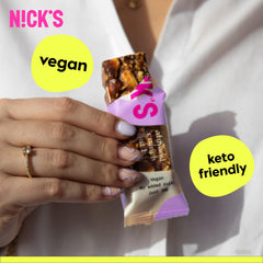 N!CK'S close-up of almond and chocolate texture highlighting crunch and flavor