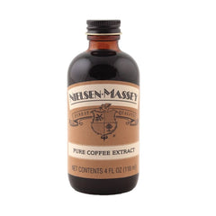 Nielsen-Massey extract pouring into measuring spoon for precise flavor control