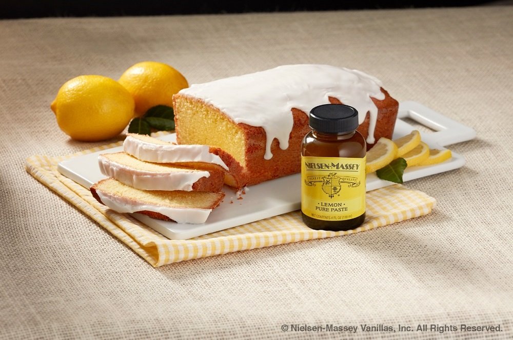 Nielsen-Massey jar next to measuring spoon showing portion control