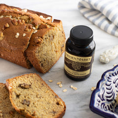 Nielsen-Massey paste swirled into buttercream for rich aroma and texture