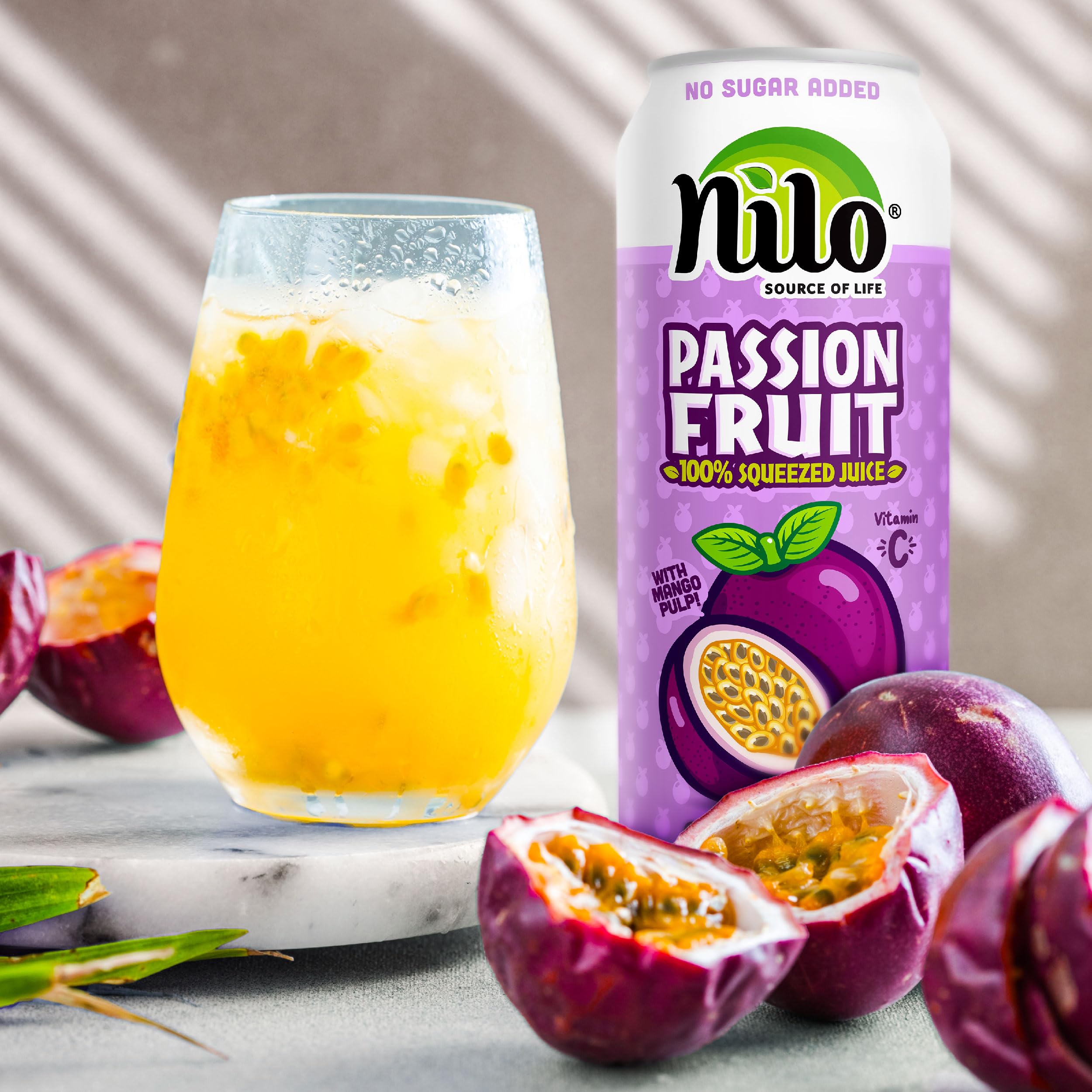 NILO poured into a glass with ice showcasing bright color and immediate refreshment