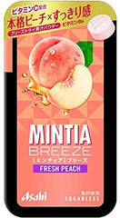 Ninjapo Mintia Breeze close-up of a peach-flavored tablet reveals texture and appeal