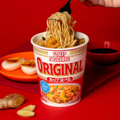 NISSIN close-up of noodles highlighting texture and fast-cooking benefit