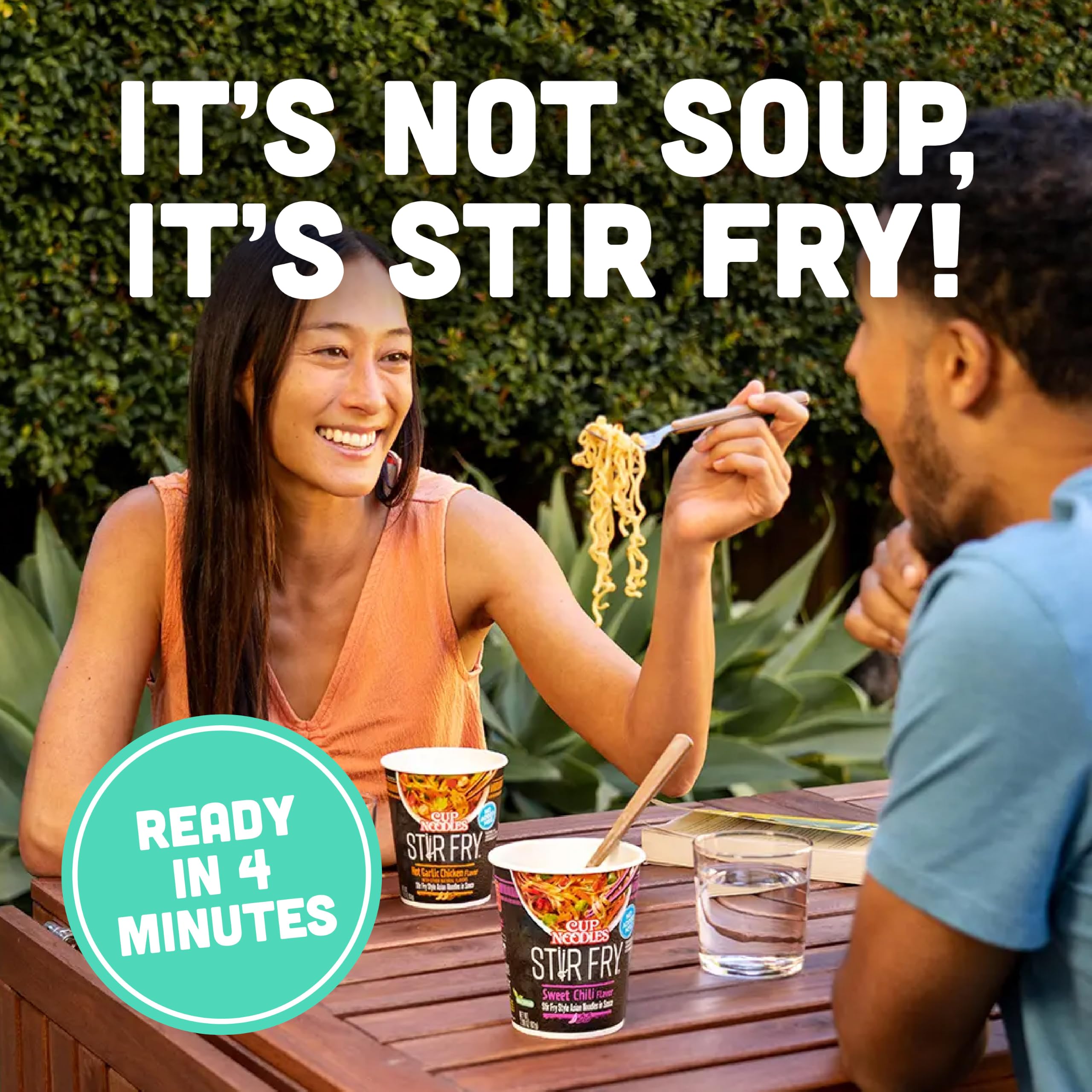 NISSIN open cup top view with saucy noodles ready to eat for quick meals
