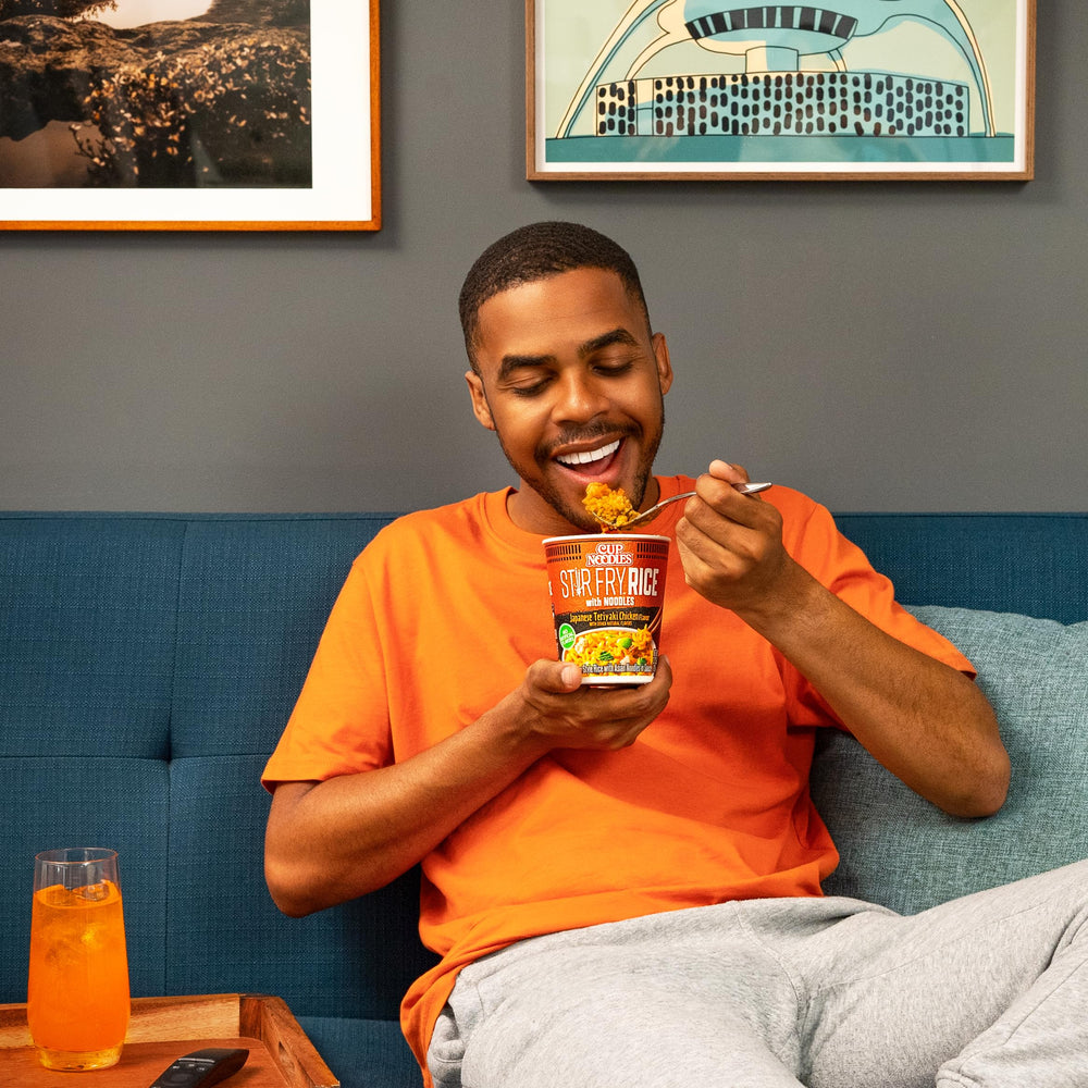 NISSIN ready-to-eat cup on table, fast hot meal benefit