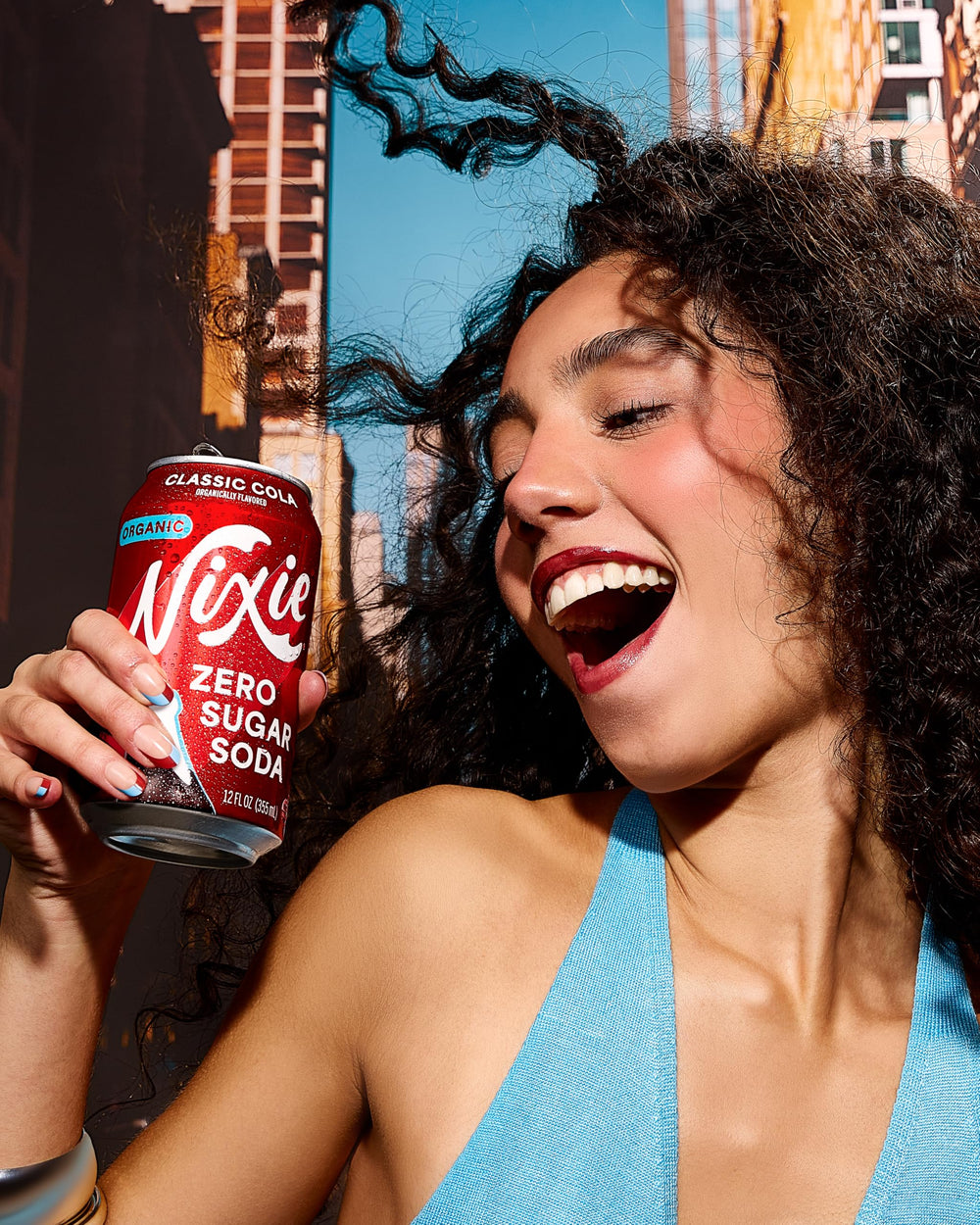 Nixie classic cola pouring into glass with foam and refreshing look