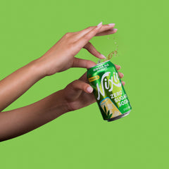 Nixie poured into glass with bubbles, shows crisp zero-sugar fizz