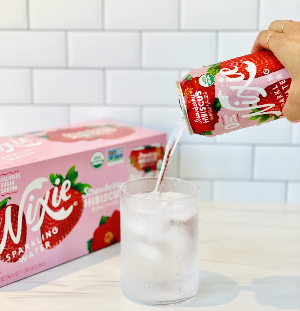 Nixie on a brunch table with food, suggests pairing and lifestyle refreshment