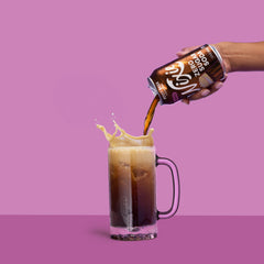 Nixie root beer poured in glass showing bubbly refreshment benefit
