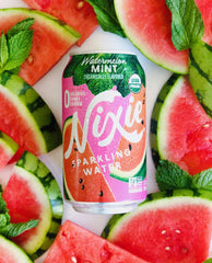 Chilled Nixie poured over ice with mint garnish demonstrating a refreshing serve