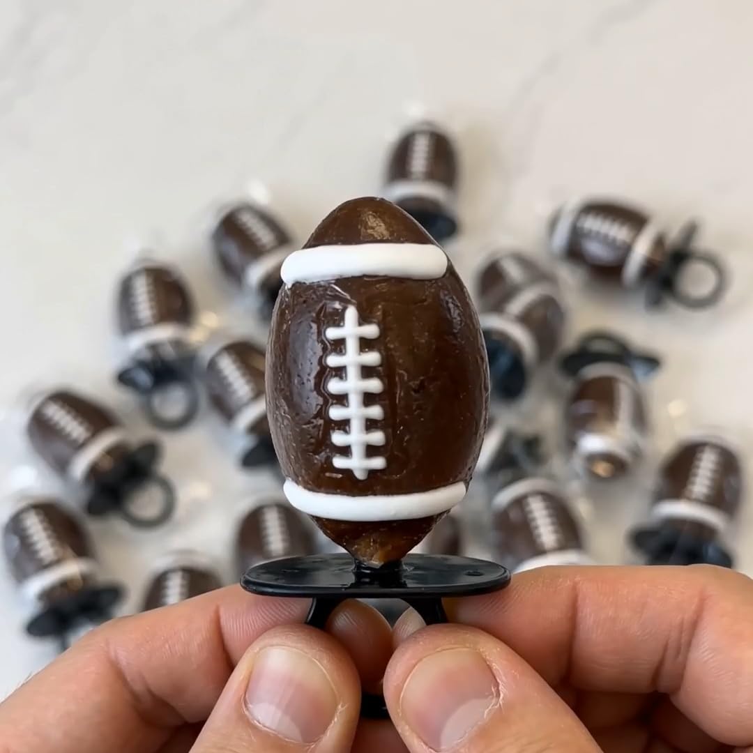 NLS Candy Co. lollipops arranged on a football-themed table adding festive snack appeal