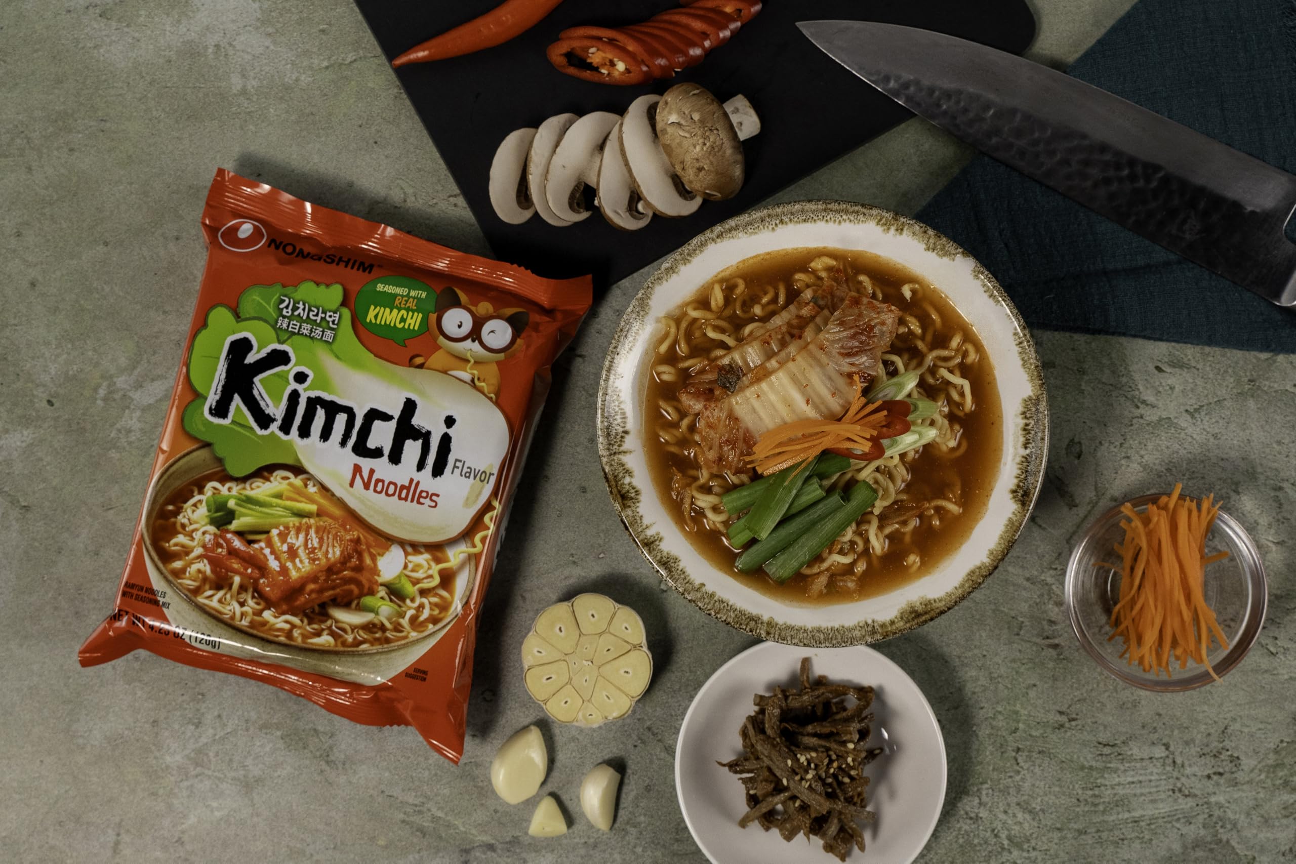 Nongshim bowl size next to common objects showing single-serve portion convenience