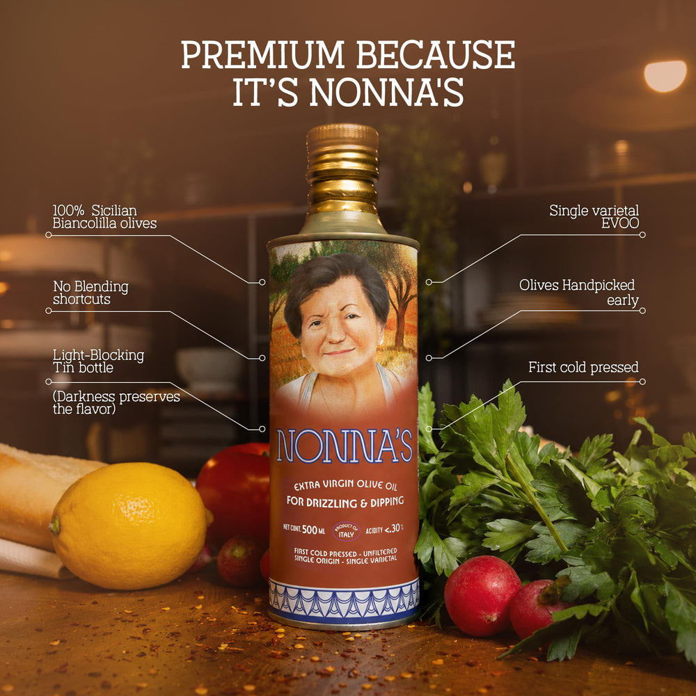 nonna's olive oil drizzling onto salad, emphasizes bright flavor and finishing use