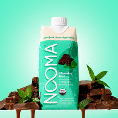 NOOMA close-up of bottle label and texture highlighting organic ingredients and clarity