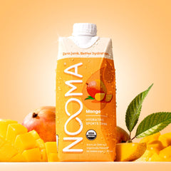 NOOMA mango bottle close-up label highlighting ingredients and no added sugar