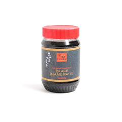 Nouka black sesame paste front jar showing label and spreadable texture for versatile use