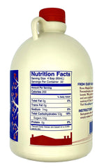 Nova Maple Syrup gallon next to a standard bottle showing size and value benefit