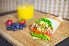 NUCO wrap filled with fresh vegetables demonstrating healthy, colorful meal option