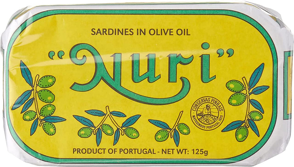 Nuri can next to a hand for scale, illustrates size and single-serve portion