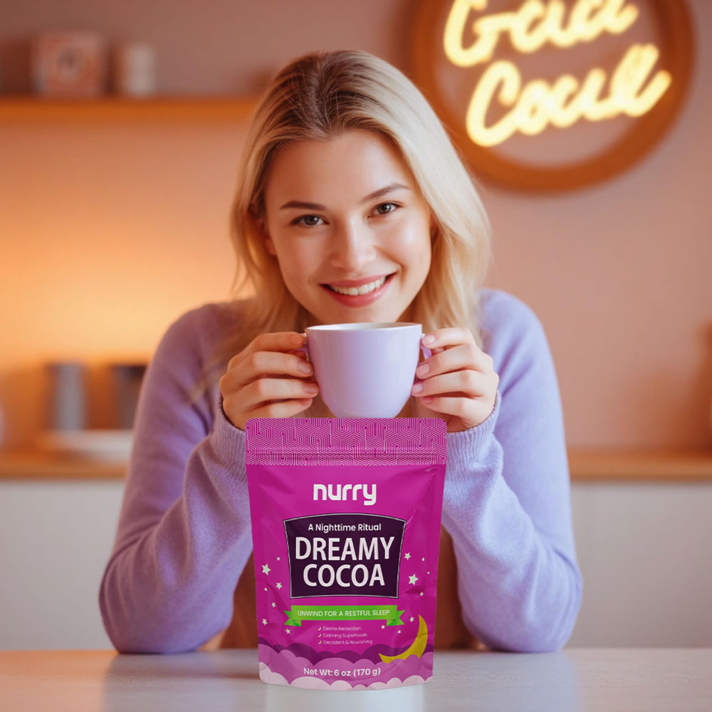 NURRY stirring cocoa in mug demonstrating quick easy preparation