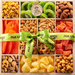 Nut Cravings front view of wooden tray gift-ready with ribbon, elegant presentation benefit