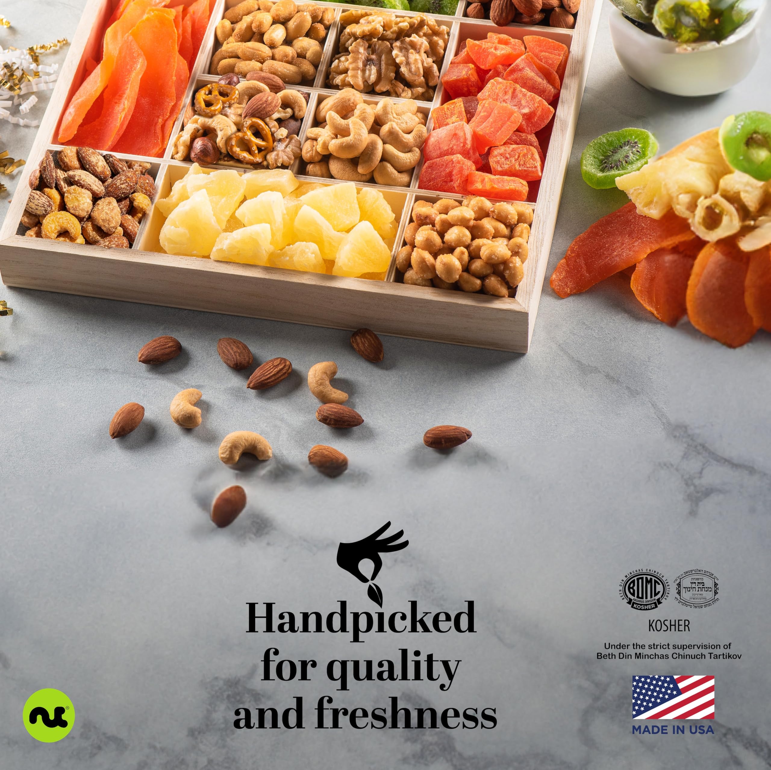 Nut Cravings snack tray on a party table with guests, crowd-pleasing variety benefit