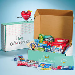 Nut Cravings open box showing varied snacks, highlights assortment appeal