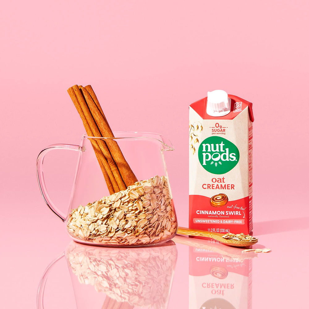 nutpods next to measuring cup demonstrating portion and size