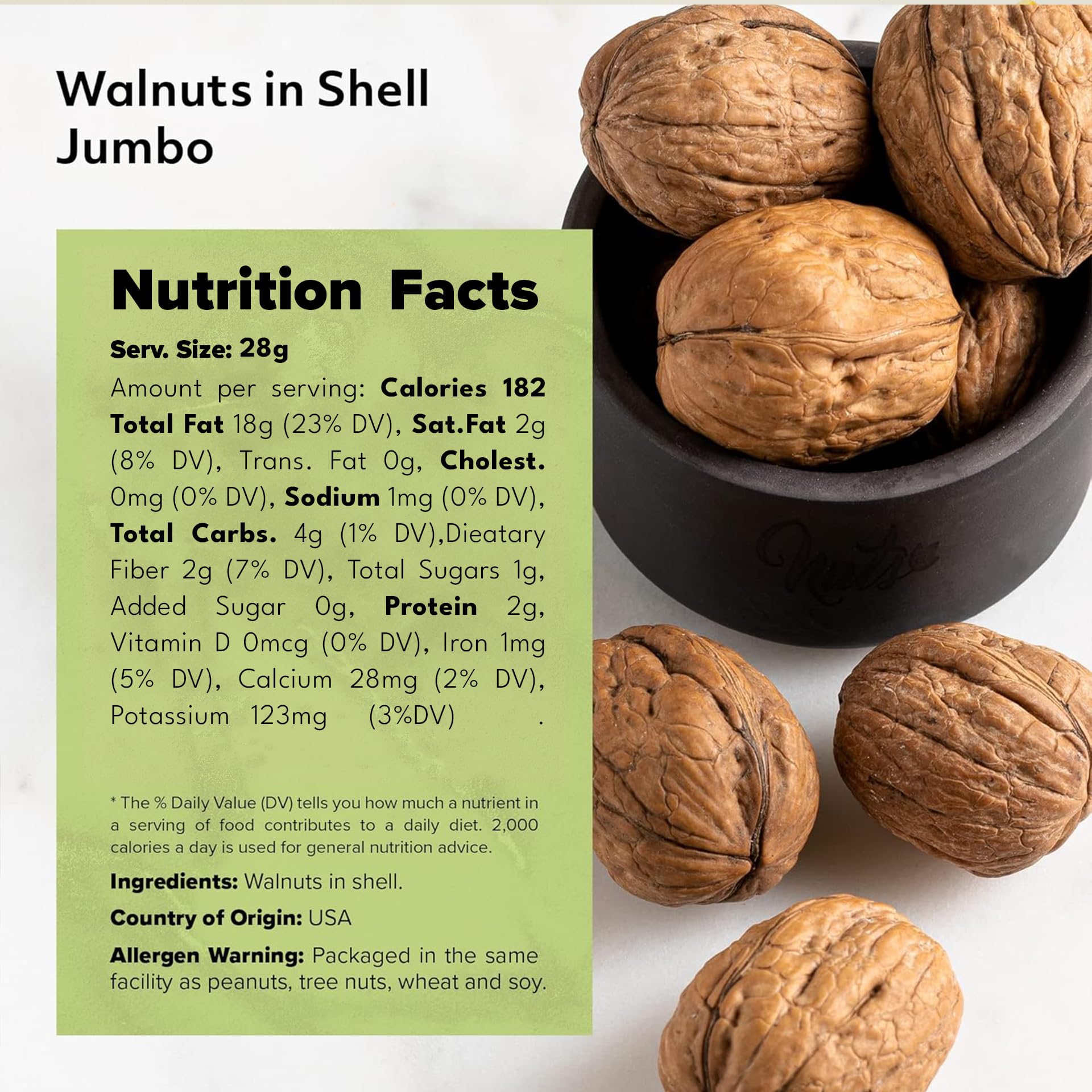 NUTS - U.S. cracked walnut with nutcracker showing effortless shelling