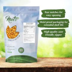 NUTS U.S. hand holding nuggets showing portion size and easy on-the-go snacking