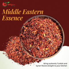 wooden spoon heaped with NY Spice Shop Aleppo flakes ready to season meals