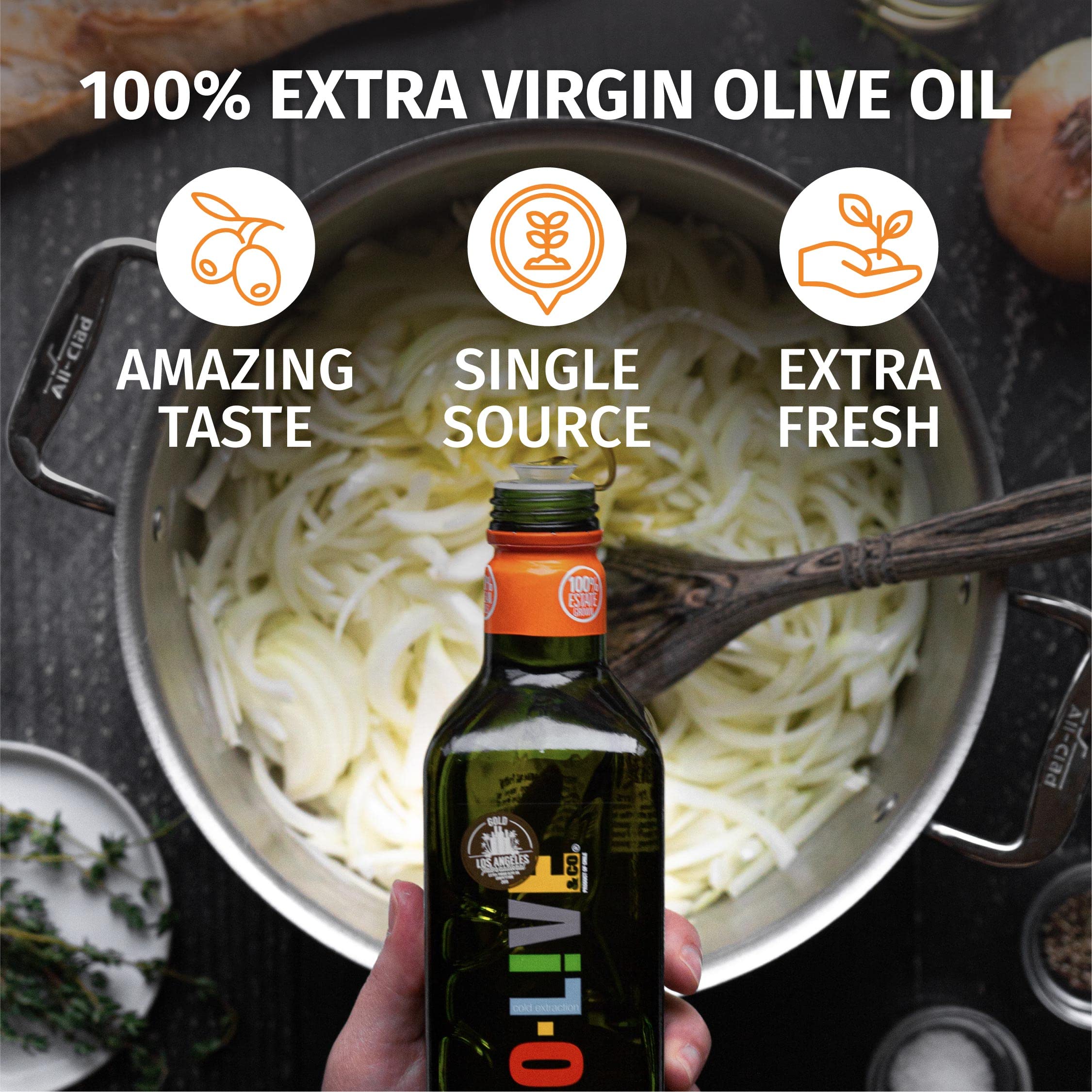 O-Live & Co. pouring over a salad to add bright flavor and finishing richness