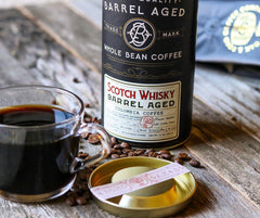 Oak & Bond spoon pouring beans demonstrating measured single-origin portioning