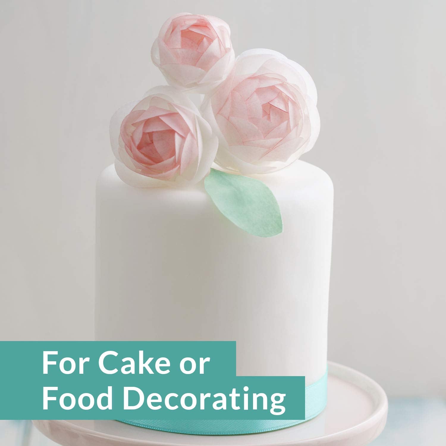 Oasis Supply cut wafer flowers arranged on cake adding lightweight elegant decoration