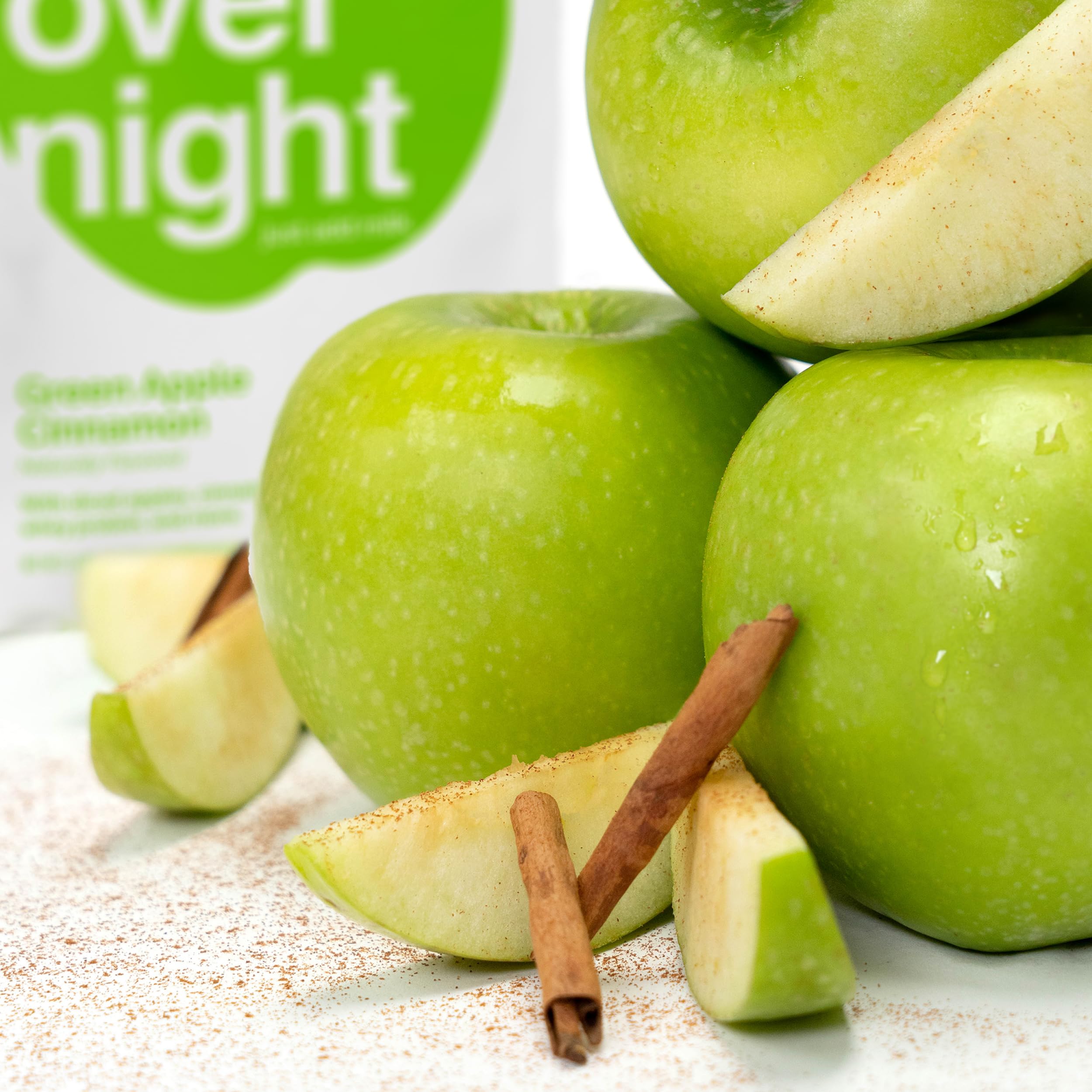 Spread of Oats Overnight ingredients highlighting apples, cinnamon, and seeds