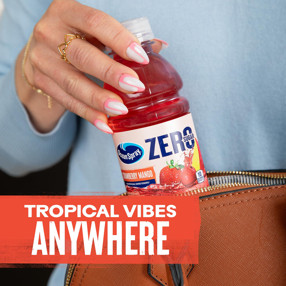 Ocean Spray bottle held in hand to show 10 fl oz size and portability
