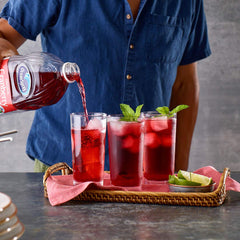 Ocean Spray juice being poured over ice highlighting refreshing taste and mixability