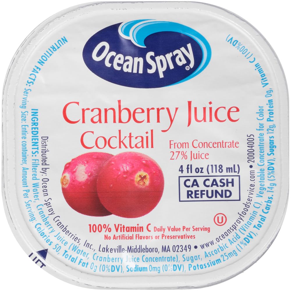 Ocean Spray cup next to a hand for scale showing compact 4 ounce serving size