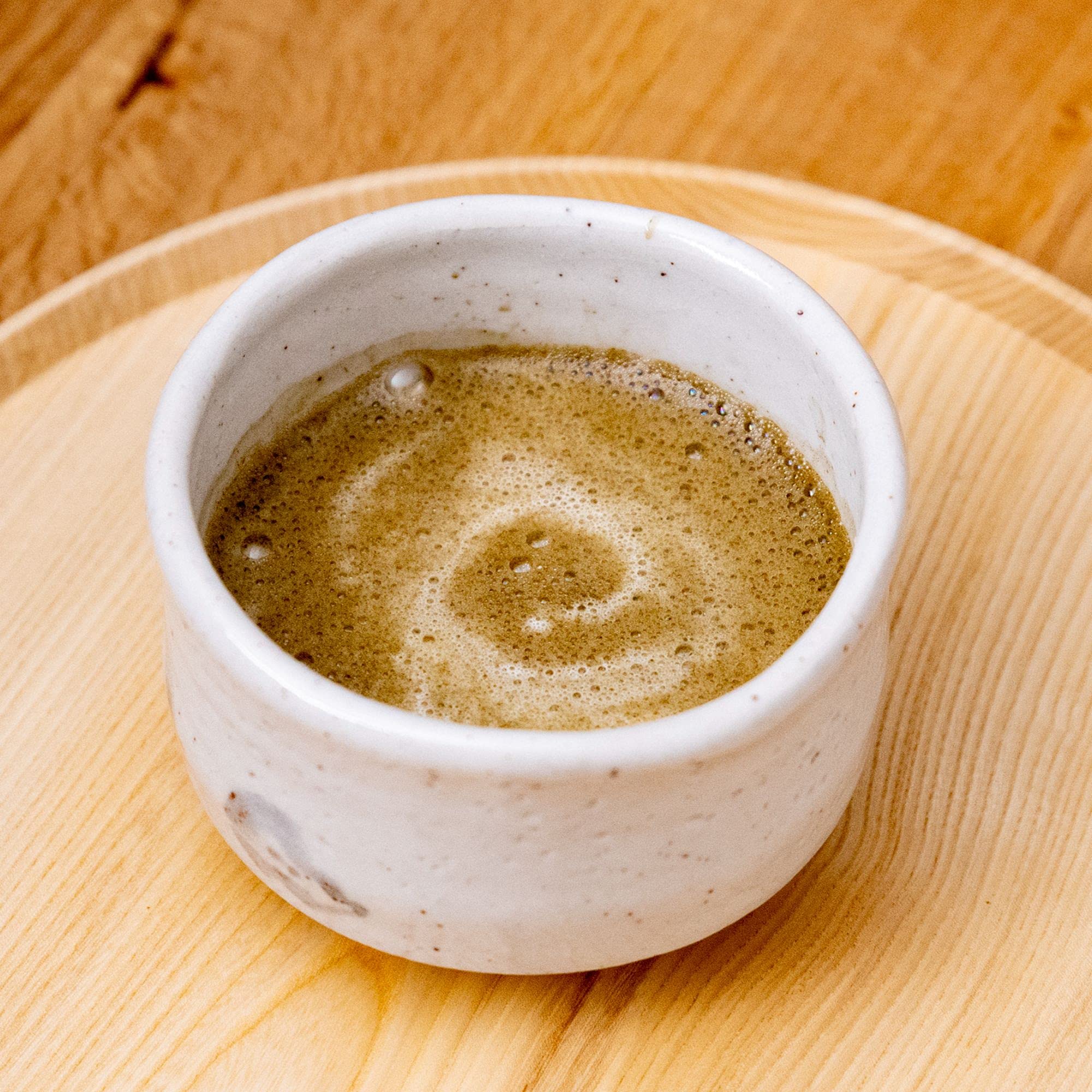 Ocha & Co. sencha leaves and kukicha twigs showing blend components and authentic sourcing benefit