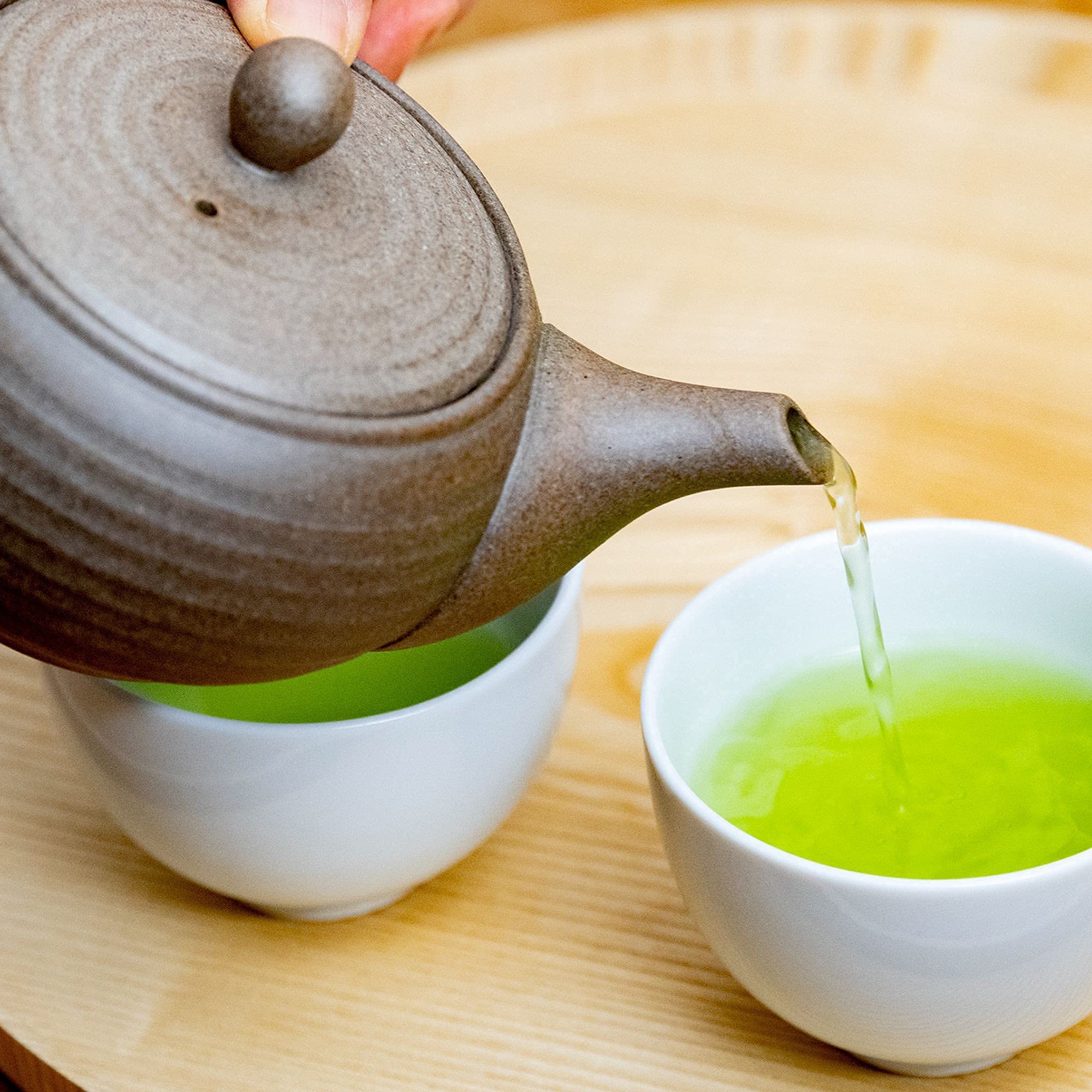 Ocha & Co. ceramic tea setup lifestyle scene conveying calming ritual