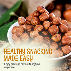 Oh! Nuts hand holding handful of hazelnuts demonstrating portion size benefit
