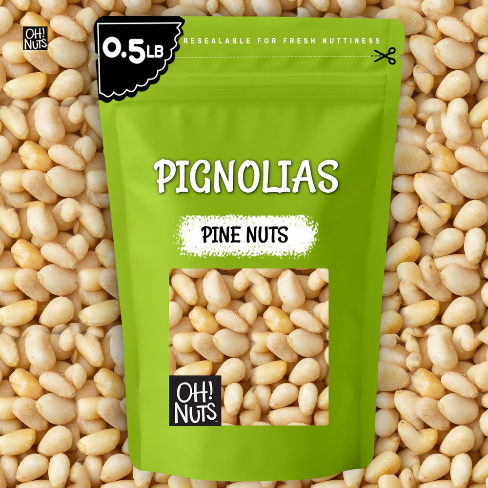 Lifestyle shot of Oh! Nuts pine nuts being added to salad in a home kitchen