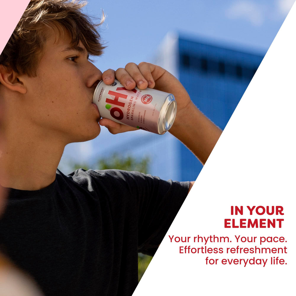 oHy raspberry can held in hand showing 12oz scale and convenient portability