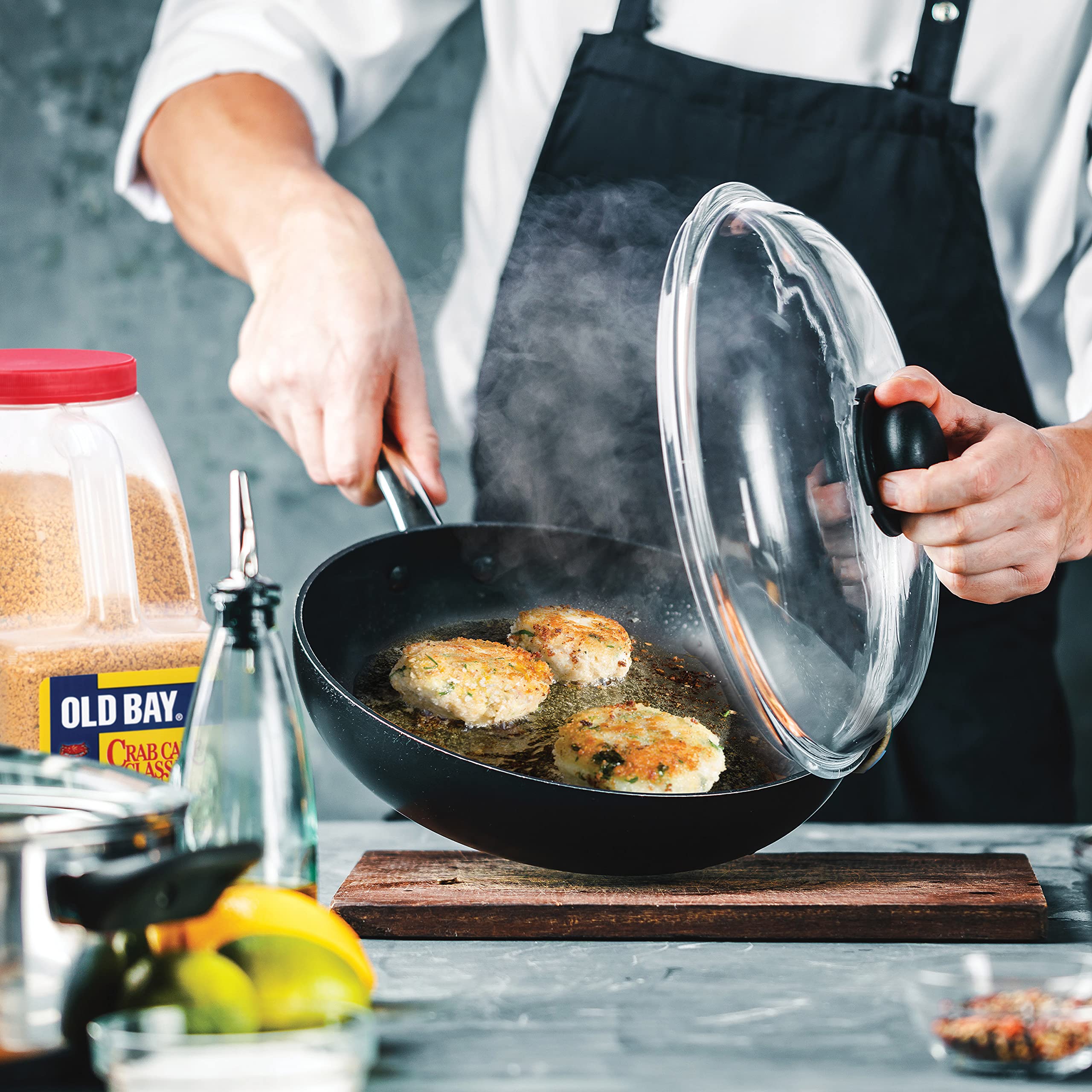OLD BAY mixing bowl with crab meat and mix demonstrating quick prep and even seasoning
