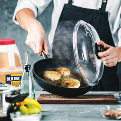 OLD BAY mixing bowl with crab meat and mix demonstrating quick prep and even seasoning