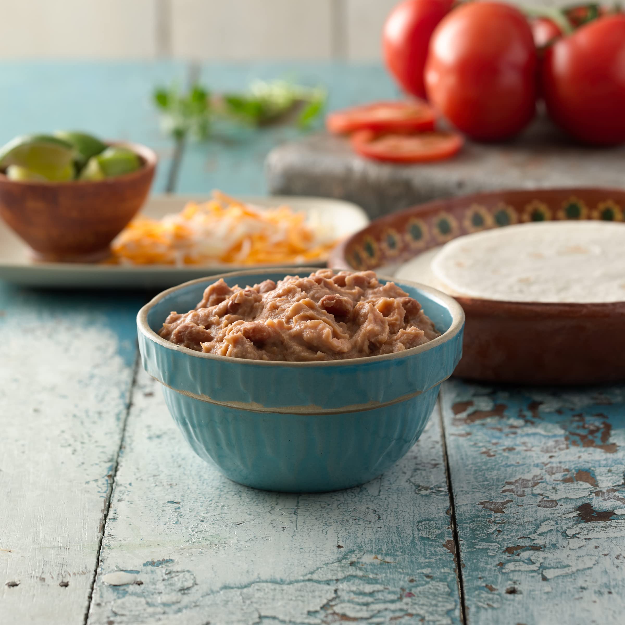 Old El Paso open-can texture close-up showing creamy beans and smooth consistency