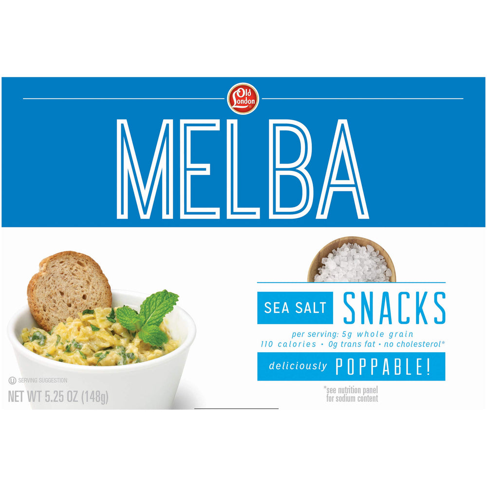 Old London melba toast close-up topped with hummus demonstrating serving idea